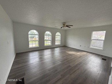 Welcome home to this beautifully remodeled home, sitting on a - photo 15