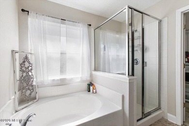 Tucked away on a quiet cul-de-sac with wooded views behind the - photo 15
