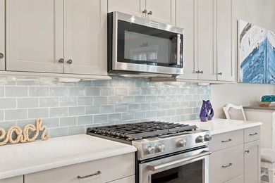 Welcome to this beautiful coastal townhome in the highly - photo 16