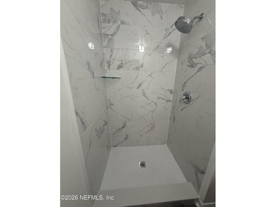 Welcome home to this beautifully remodeled home, sitting on a - photo 18