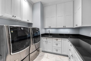 Experience the pinnacle of luxury living in this custom British - photo 25