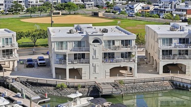 Commanding spectacular panoramic views of Cedar Island and the - photo 2