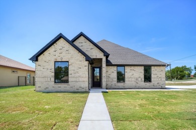 Lake Home For Sale in Runaway Bay, Texas