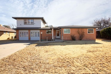 MUST SEE IN PERSON!! This unique home in Wolflin has so much