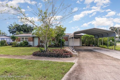 Nestled in the heart of Cocoa, this home combines comfort and - photo 1