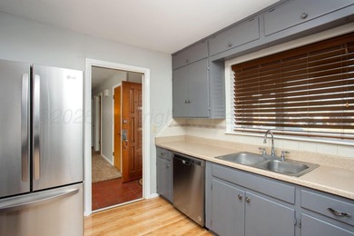 MUST SEE IN PERSON!! This unique home in Wolflin has so much