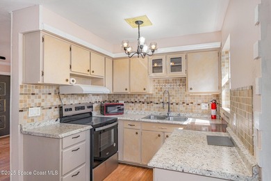 Nestled in the heart of Cocoa, this home combines comfort and - photo 5