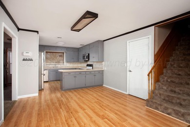 MUST SEE IN PERSON!! This unique home in Wolflin has so much