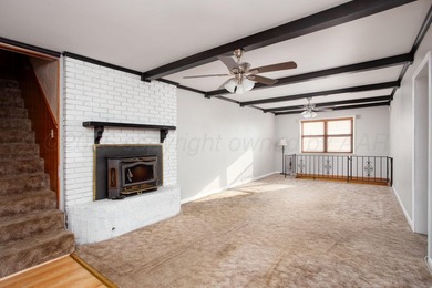 MUST SEE IN PERSON!! This unique home in Wolflin has so much