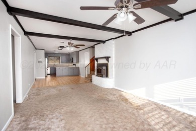 MUST SEE IN PERSON!! This unique home in Wolflin has so much