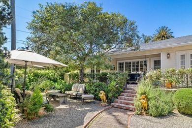 Welcome to this enchanting 2-bedroom, 2-bathroom cottage nestled - photo 1