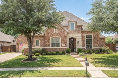 Welcome Home! Nestled on a corner lot in the sought-after - photo 1
