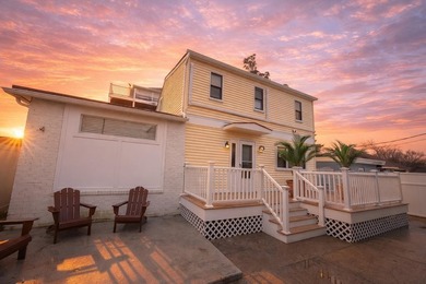 Welcome to this stunning coastal home, meticulously renovated - photo 1