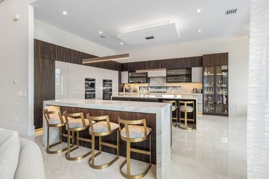 Located in the prestigious Boca Bridges community, this stunning - photo 11