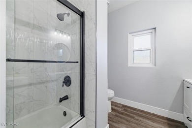 Single-story custom home in the NW with no HOA & paid-off solar!