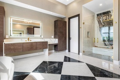 Located in the prestigious Boca Bridges community, this stunning - photo 23