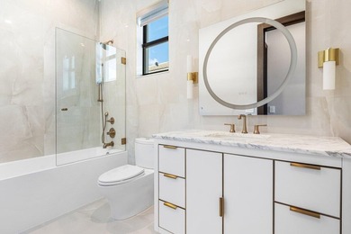 Located in the prestigious Boca Bridges community, this stunning - photo 29