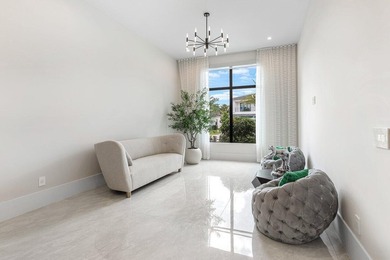 Located in the prestigious Boca Bridges community, this stunning - photo 40