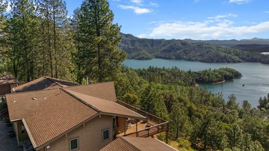 Discover custom living with breathtaking panoramic views of Lake - photo 1