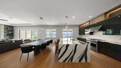 This never-lived-in luxury residence presents an extraordinary - photo 11