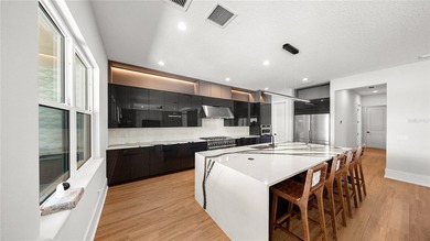 This never-lived-in luxury residence presents an extraordinary - photo 13