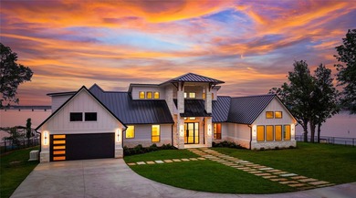 Estate-style waterfront new construction on approximately .58 - photo 1