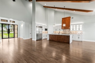 Estate-style waterfront new construction on approximately .58 - photo 5