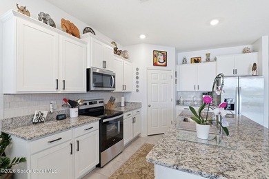 Welcome to this stunning home positioned on a premium lot with a - photo 12