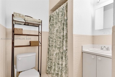 Set on a quiet street in South Miami, this inviting residence - photo 22