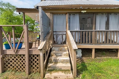 Nestled on nearly an acre, this charming three-bedroom - photo 5