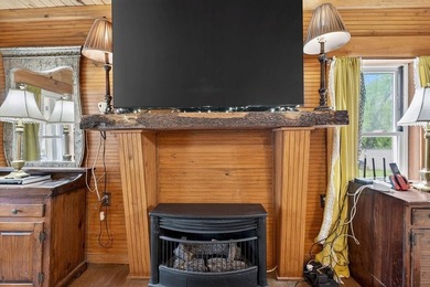 Nestled on nearly an acre, this charming three-bedroom - photo 10