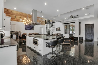 Experience luxury lakefront living at its finest in this - photo 13