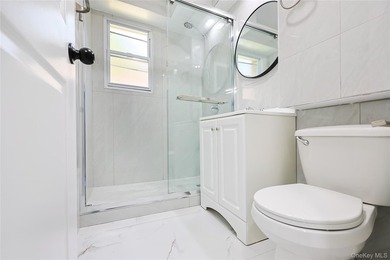 Welcome to this fully renovated 2-Family Condo Townhouse located - photo 15