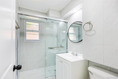 Welcome to this fully renovated 2-Family Condo Townhouse located - photo 16