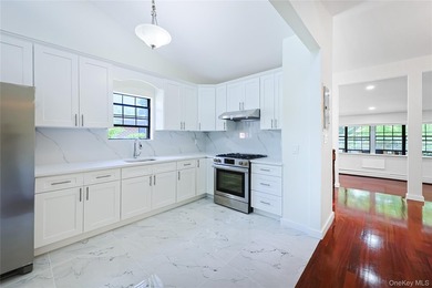 Welcome to this fully renovated 2-Family Condo Townhouse located - photo 32