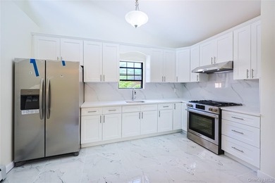 Welcome to this fully renovated 2-Family Condo Townhouse located - photo 33
