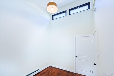 Welcome to this fully renovated 2-Family Condo Townhouse located - photo 36