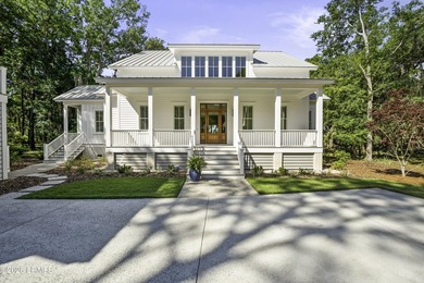Discover unparalleled waterfront living in this custom-built - photo 12