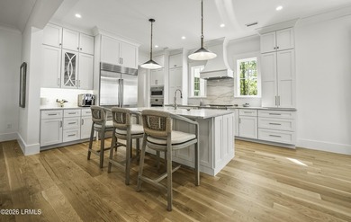 Discover unparalleled waterfront living in this custom-built - photo 25