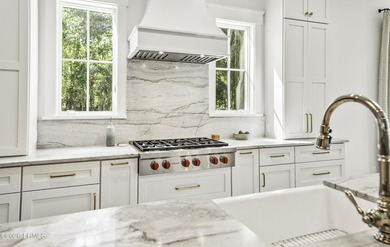 Discover unparalleled waterfront living in this custom-built - photo 26