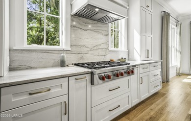Discover unparalleled waterfront living in this custom-built - photo 29