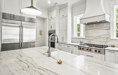 Discover unparalleled waterfront living in this custom-built - photo 30