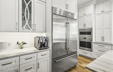 Discover unparalleled waterfront living in this custom-built - photo 31