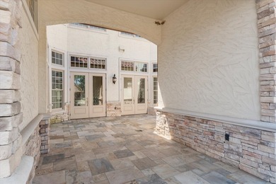 Enter through a grand entry with striking iron doors opening - photo 33