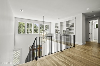 Discover unparalleled waterfront living in this custom-built - photo 49