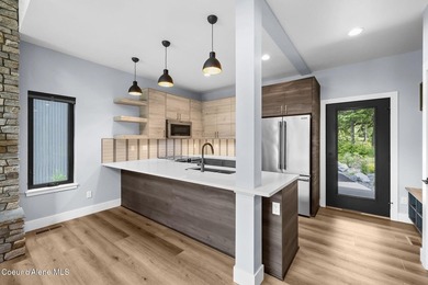 Nestled on the picturesque Priest Lake Golf Club, this brand new - photo 12