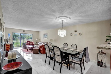 Updated 2 bedroom, 2 bathroom condo. Features an open floor plan - photo 13
