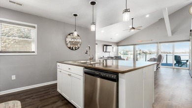 Experience the ultimate waterfront oasis in this masterfully - photo 17