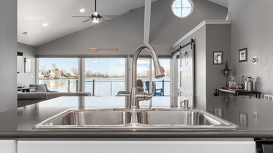 Experience the ultimate waterfront oasis in this masterfully - photo 21