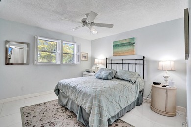 Updated 2 bedroom, 2 bathroom condo. Features an open floor plan - photo 21